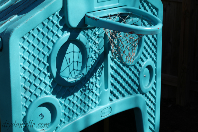 Some wear and tear along high traffic areas of a plastic painting playhouse. Minimal wear and wear on a painted plastic playhouse.