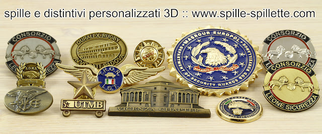 spillette, pins e distintivi