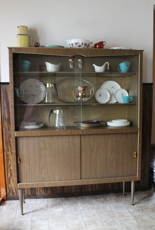 mid century 1950s china cabinet with vintage dishes collection