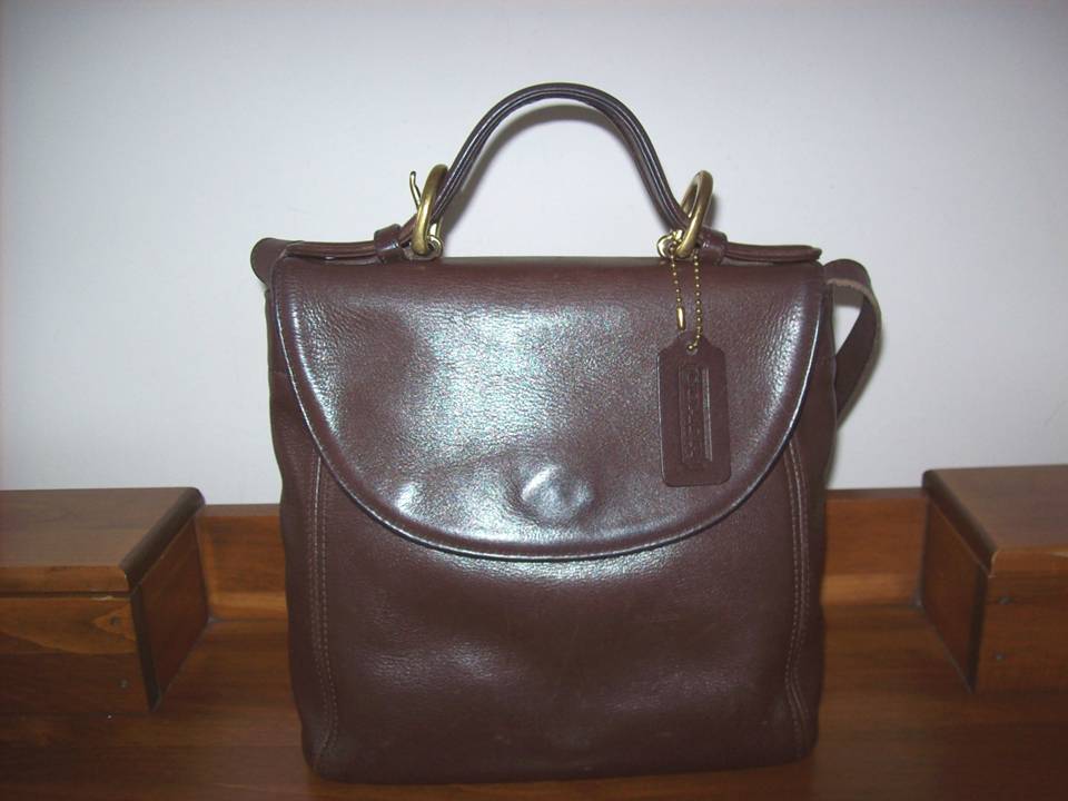 new and preowned branded handbag
