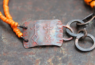 orange shaman rockpainting bracelet etched plate