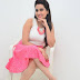 TV Anchor Manjusha In White Top Pink Mini Skirt At Showroom Launch