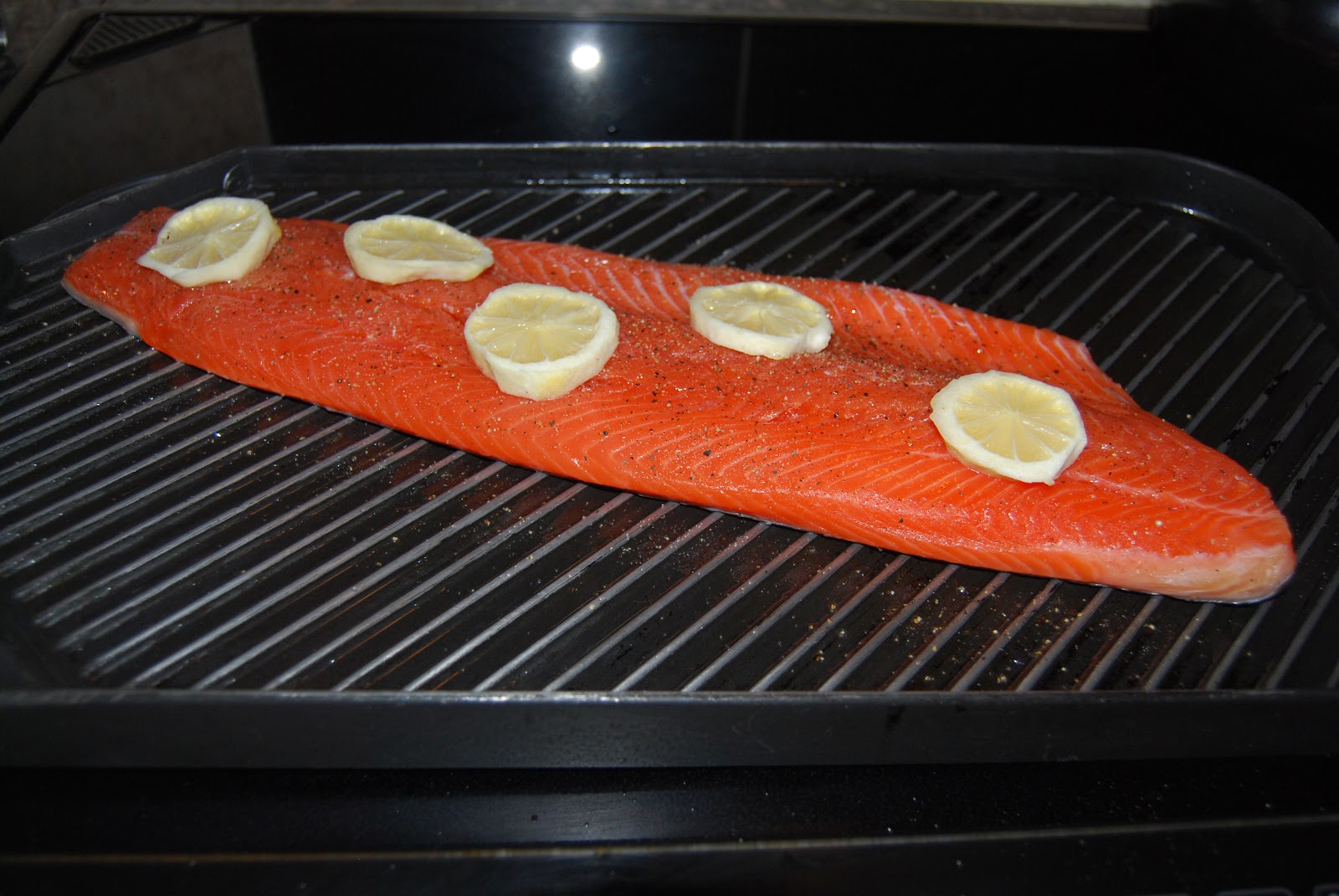 Greek Fusion Cuisine Salmon with Lemon Artichoke and Capers Sauce
