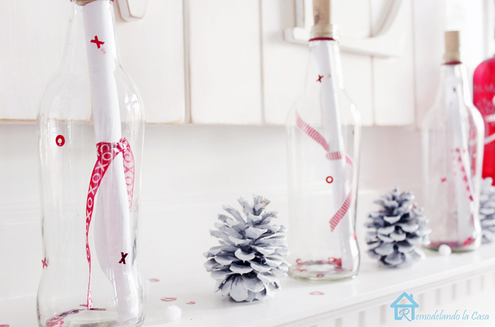 Clear glass bottles with paper messages for Valentines