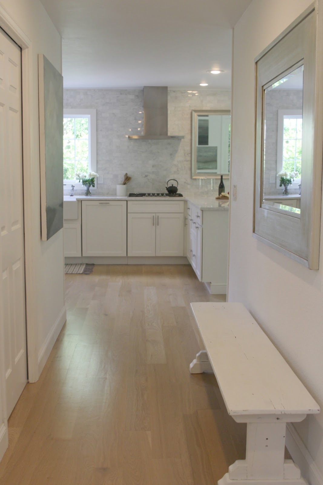 White oak hardwood flooring left natural in my white kitchen. Come be inspired on Hello Lovely by 7 Low Cost Timeless Decorating Ideas That Don't Involve the Dollar Store As Well As Photos Around My House.