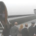 Overwhelmed Prince George needs a little encouragement from Dad as Kate and William arrive in Warsaw - but little sister Charlotte is all smiles