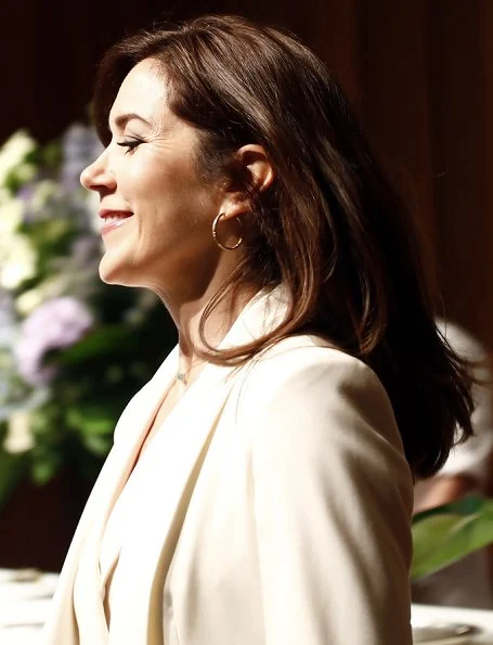 Crown Princess Mary is wearing an outfit by Max Mara. Princess wore Max Mara- silk panama jacket, and jumpsuit, trousers