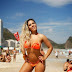 Woman Melon gives first 2015 kiss on beach in Rio: 'Very lucky'