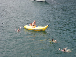 Elsie on a banana boat.  It gets pulled by a speed boat and is very flippy.