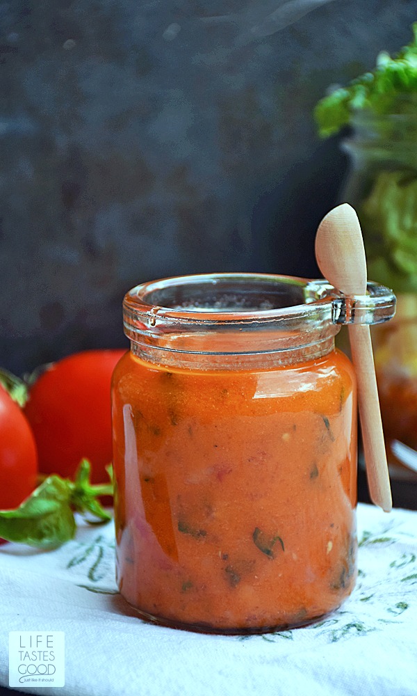 Tomato Vinaigrette Dressing by Life Tastes Good is a light and tangy dressing to coat just about any green salad deliciously. Loaded with fresh herbs and tomatoes in a simple oil and vinegar emulsion, this vinaigrette will have you craving salads!