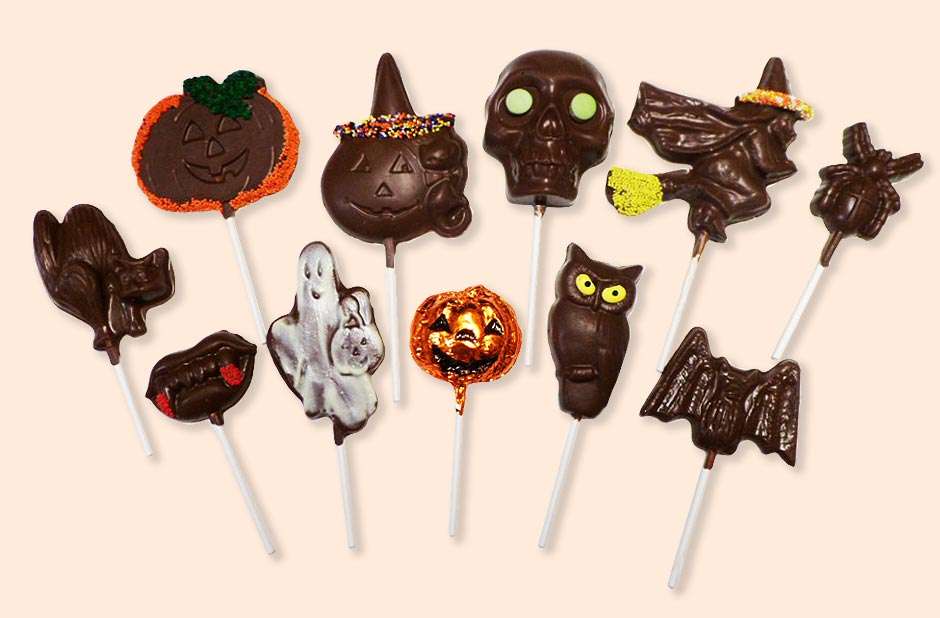 Как раскрашивать шоколадные фигурки. Шоколадные конфеты Хэллоуин. Хэллоуин сладости конфеты. Леденцы на Хэллоуин. Шоколад на Хэллоуин.