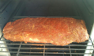 Image of Pork Ribs as they are going into the smoker