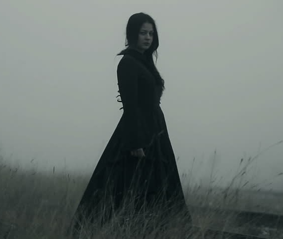 the woman in black dress