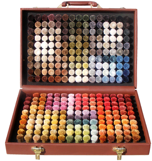 scatole di pom colore tappeto