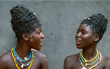 Shai Initiates are wearing unique headdresses called cheia. Photo Copyright Carol Beckwith & Angela Fisher 1993 from the collection of African Ceremonies.