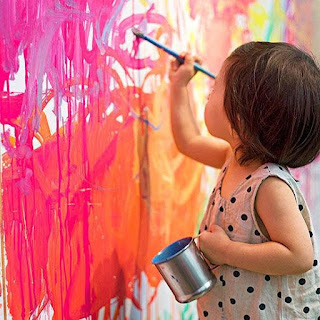Child painting unknown photographer