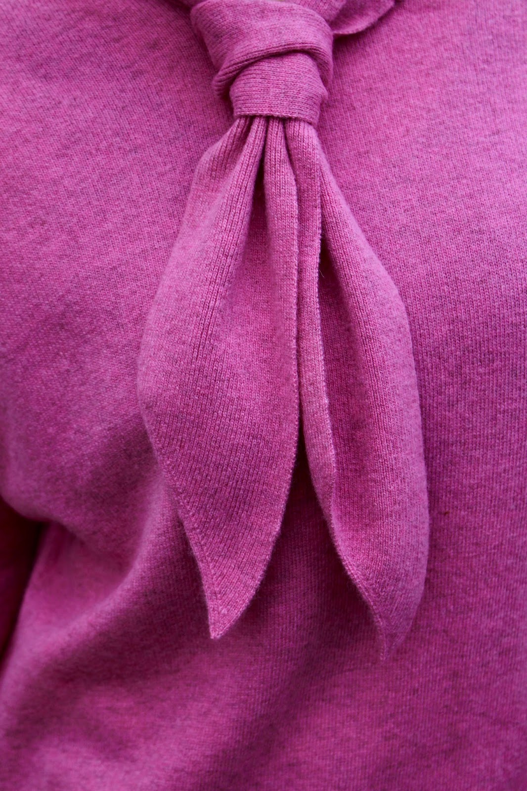 Pink pussy bow knit.