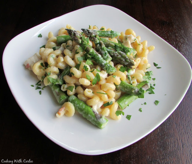 Creamy One Pot ABC Pasta is quick, easy and full of asparagus, bacon and chicken curly pasta with creamy sauce, asparagus and chicken on plate