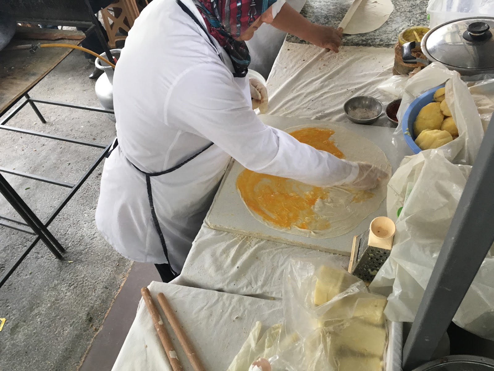 LeeZe visits Izmir Sunday farmer’s market. The lady is making my breakfast using two eggs and some white melting cheese.