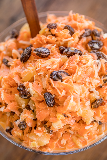 Carrot Salad - an easy and delicious side dish!! Only 6 ingredients - carrots, raisins, pineapple, coconut, sugar and mayonnaise. Reminds me of the carrot salad from Chick-fil-a!! SO good! Great side dish for potlucks or brunch. Can make in advance and refrigerate until ready to serve. YUM! #sidedish #carrotsalad #saladrecipe Carrot Salad - an easy and delicious side dish!! Only 6 ingredients - carrots, raisins, pineapple, coconut, sugar and mayonnaise. Reminds me of the carrot salad from Chick-fil-a!! SO good! Great side dish for potlucks or brunch. Can make in advance and refrigerate until ready to serve. YUM! #sidedish #carrotsalad #saladrecipe
