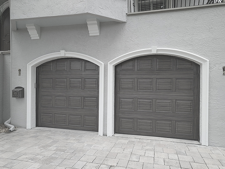 Garage Doors Painted To Like They Have A Gray Wood Grain