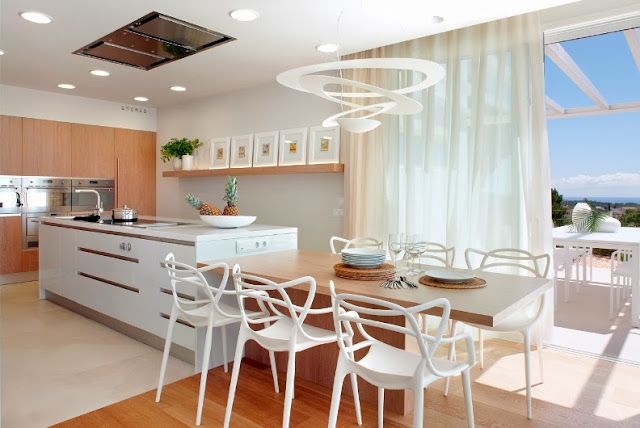 cocina de diseño con isla de cocción