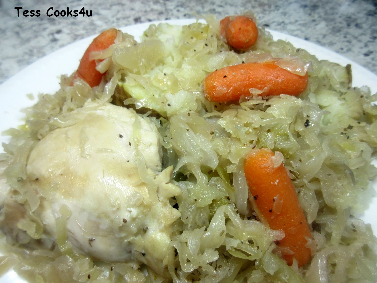 Tess Cooks4u New Years Chicken and Sauerkraut over Baked Potaotes