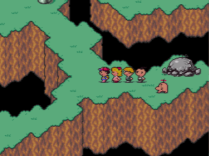 The party explores the Cave of the Past in EarthBound - or the present version of it, anyway.