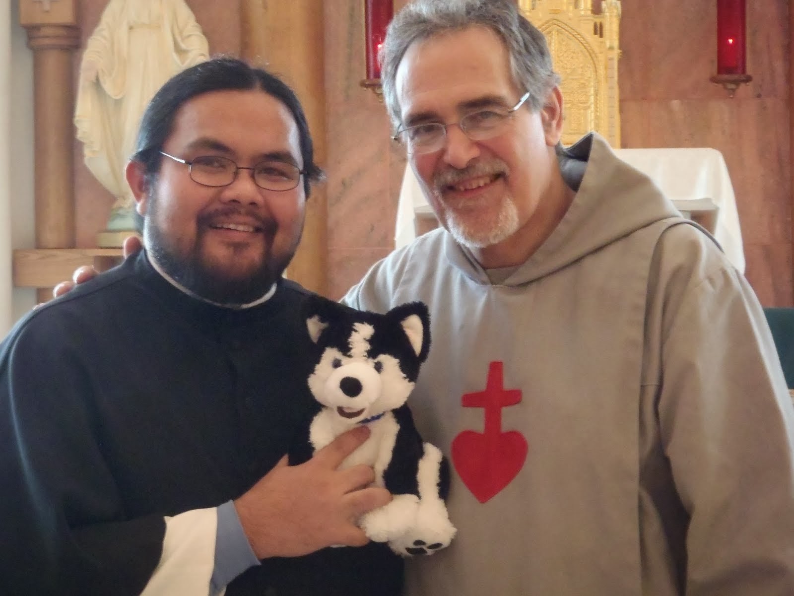 Fr Michael Shields Fr Patrick and the puppy March 4 2014