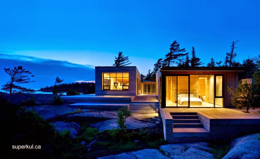 Arquitectura de Casas: Cabaña moderna de madera con techo metálico en