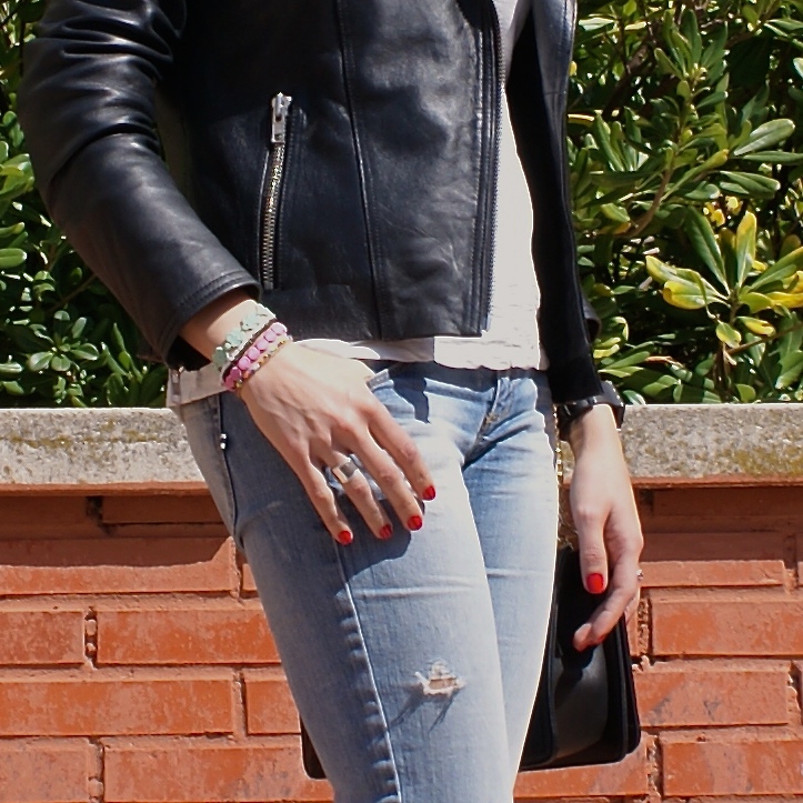 ripped jeans and cruciani bracelets