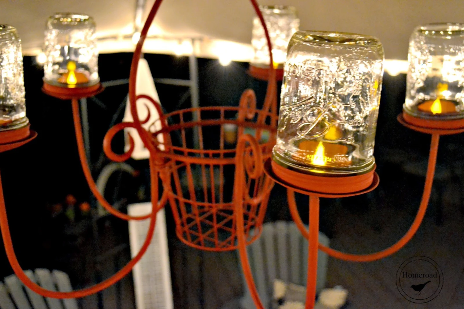 Outdoor chandelier with mason jar tea lights