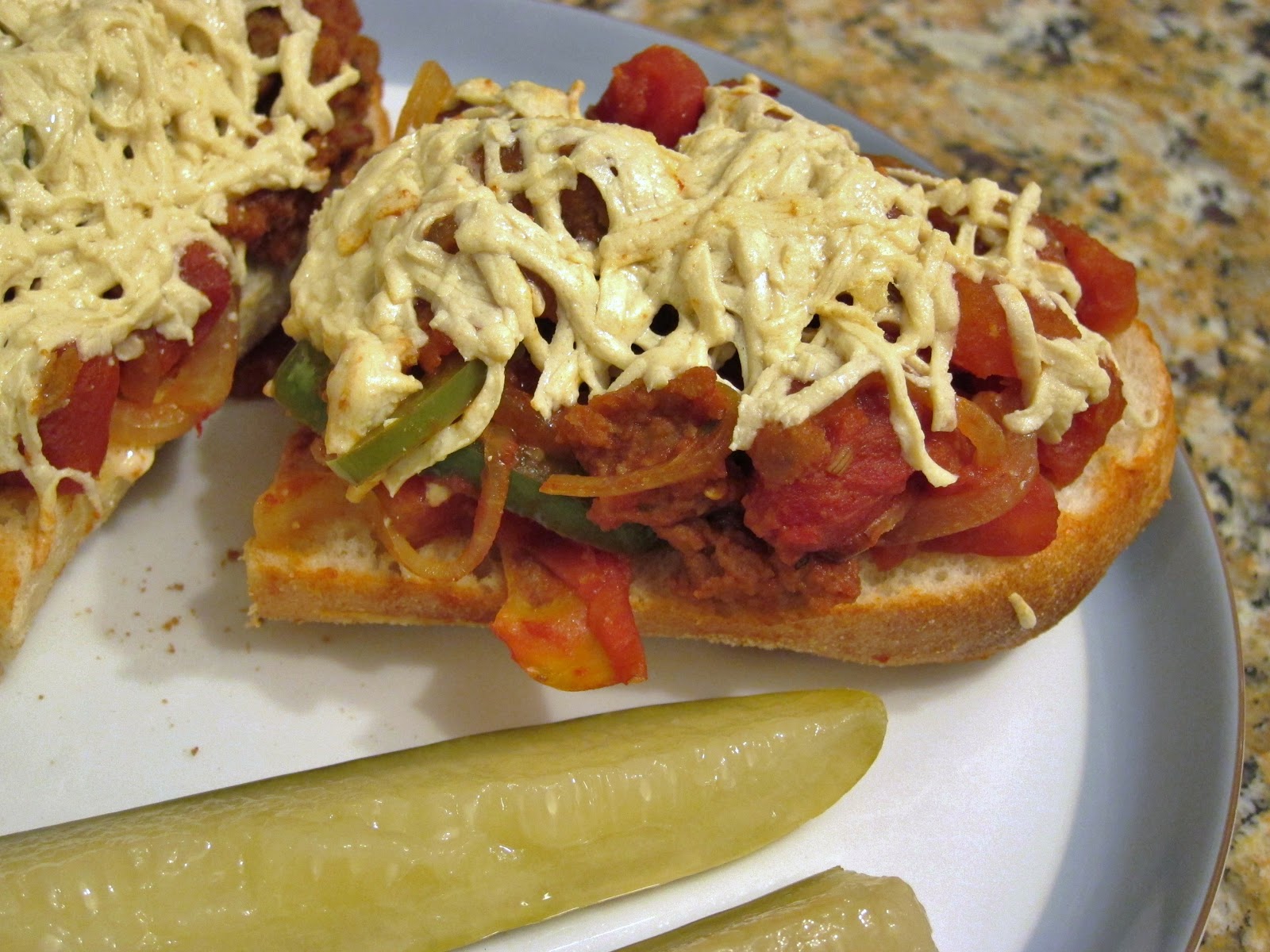 The Vegan Chronicle Sausage, Pepper, and Onion Pizza