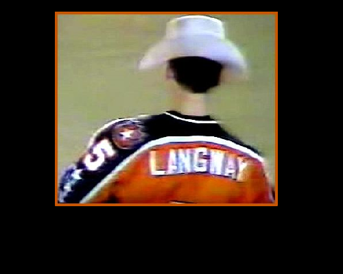 Calgary, home of the Stampede Rodeo, gave players cowboy hats to wear during introductions. Rod Langway gives the Saddledome crowd a pregame giggle.