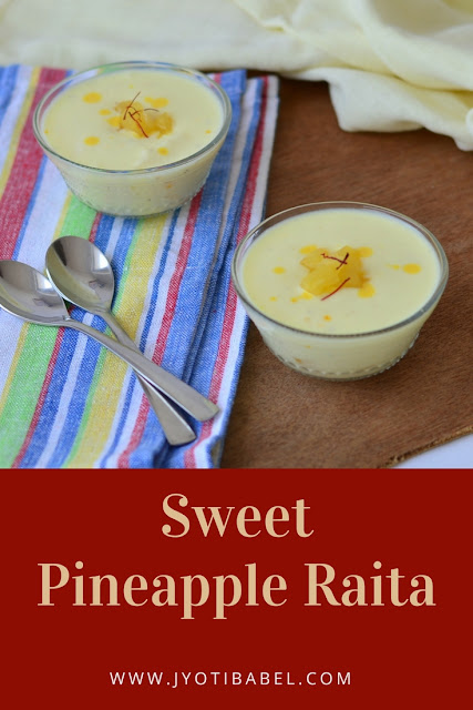 Sweet Pineapple Raita makes for a great accompaniment to any meal. Mildly sweetened yoghurt flavoured with cardamom, saffron with tiny chunks of sweetened canned pineapple, this sweet pineapple raita is a treat in itself. Recipe at www.jyotibabel.com