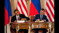 President Obama and Russian President Medvedev sign the New Strategic Arms Reduction Treaty (START).