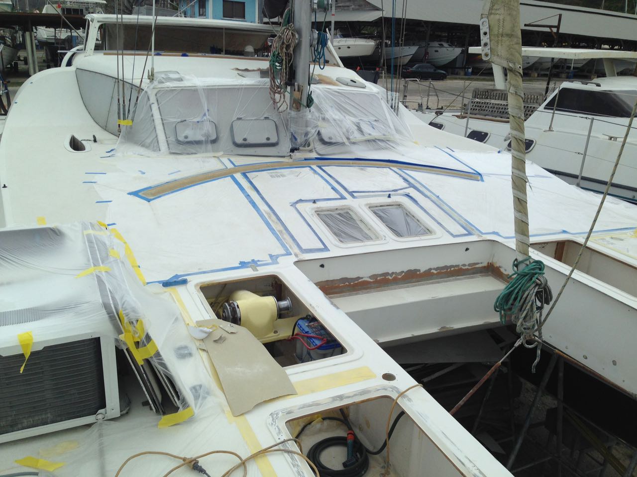 S/Y RAPTOR Spray Painting Our Deck
