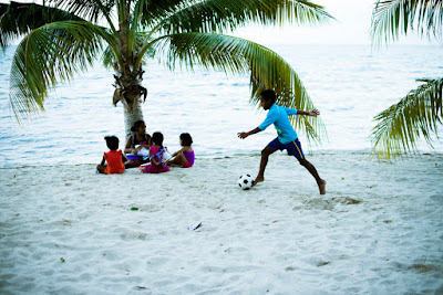 Remax Vip Belize: Local kids playing soccer