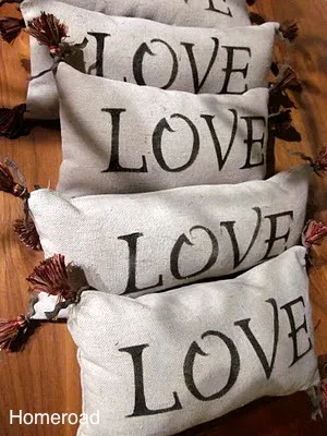 row of several love pillows