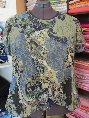 Blue Halston Sheer Crossover Knit Top www.sewplus.blogspot.com