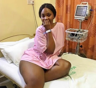  Photo: Bootilicious Tanzanian model Sanchoka strikes sultry pose in skimpy gown on hospital bed...waiting for her doctor