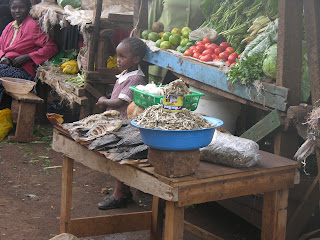 fried fish and vegetables in Kibera, Nairobi