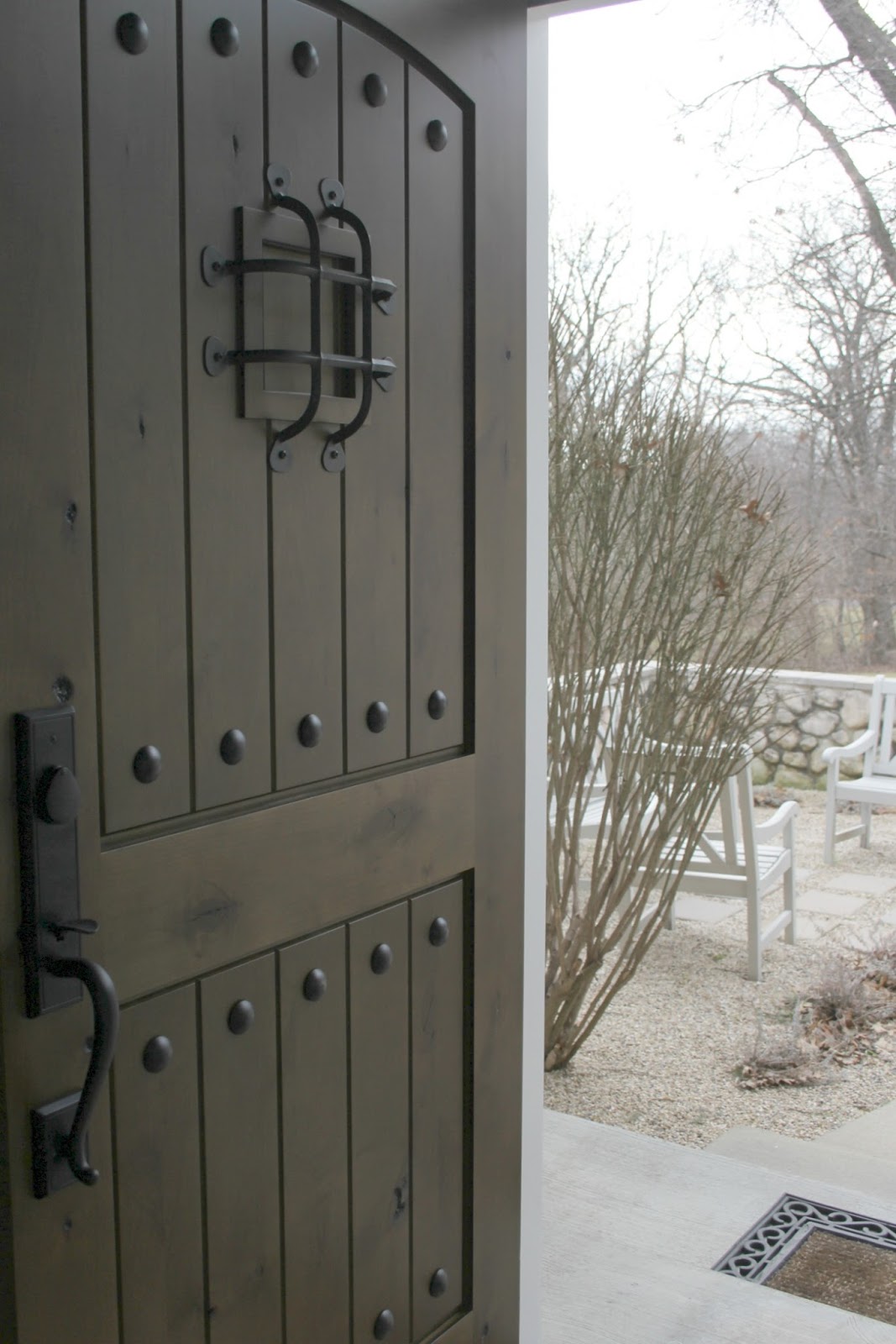 Rustic alder exterior door with walnut finish and San Jose handleset from Pacific Entries