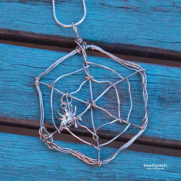 http://www.doodlecraftblog.com/2015/10/wire-wrapped-spider-web-necklace.html