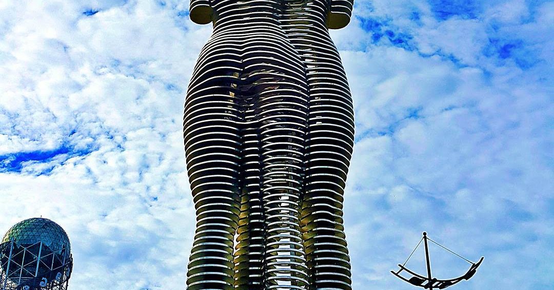 Moving Statues Of A Man And Woman Pass Through Each Other Daily