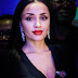 Lara Oshiomole Stuns In Plunging Neckline Dress At The Vintage Red Ball in London