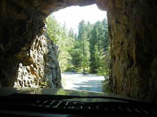 Narrow tunnels while driving on the Needles Highway in Custer State Park in South Dakota