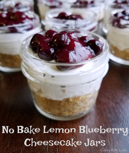 Fluffy and luscious, these no bake lemon blueberry cheesecakes are like taking a bite of spring if spring was a lemon cheesecake cloud! Really though, they are so good! These little no bake lemon cheesecakes are served in an individual jar making them perfectly portable, giftable or hide-able if you want to keep them for yourself! The easy homemade blueberry topping is the perfect accompaniment to make them shine.