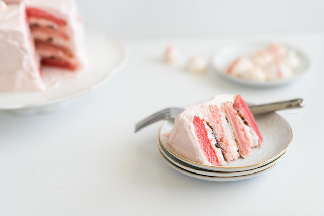 This Strawberry Cake Recipe is perfect to celebrate any special occasion.  The homemade frosting is delicious. Pin it now and bake it later! 