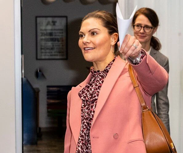 Crown Princess Victoria wore Rodebjer Nera pink blazer, Lexington Janina print blouse. Af Klingberg red suede boots, Camilla Thulin